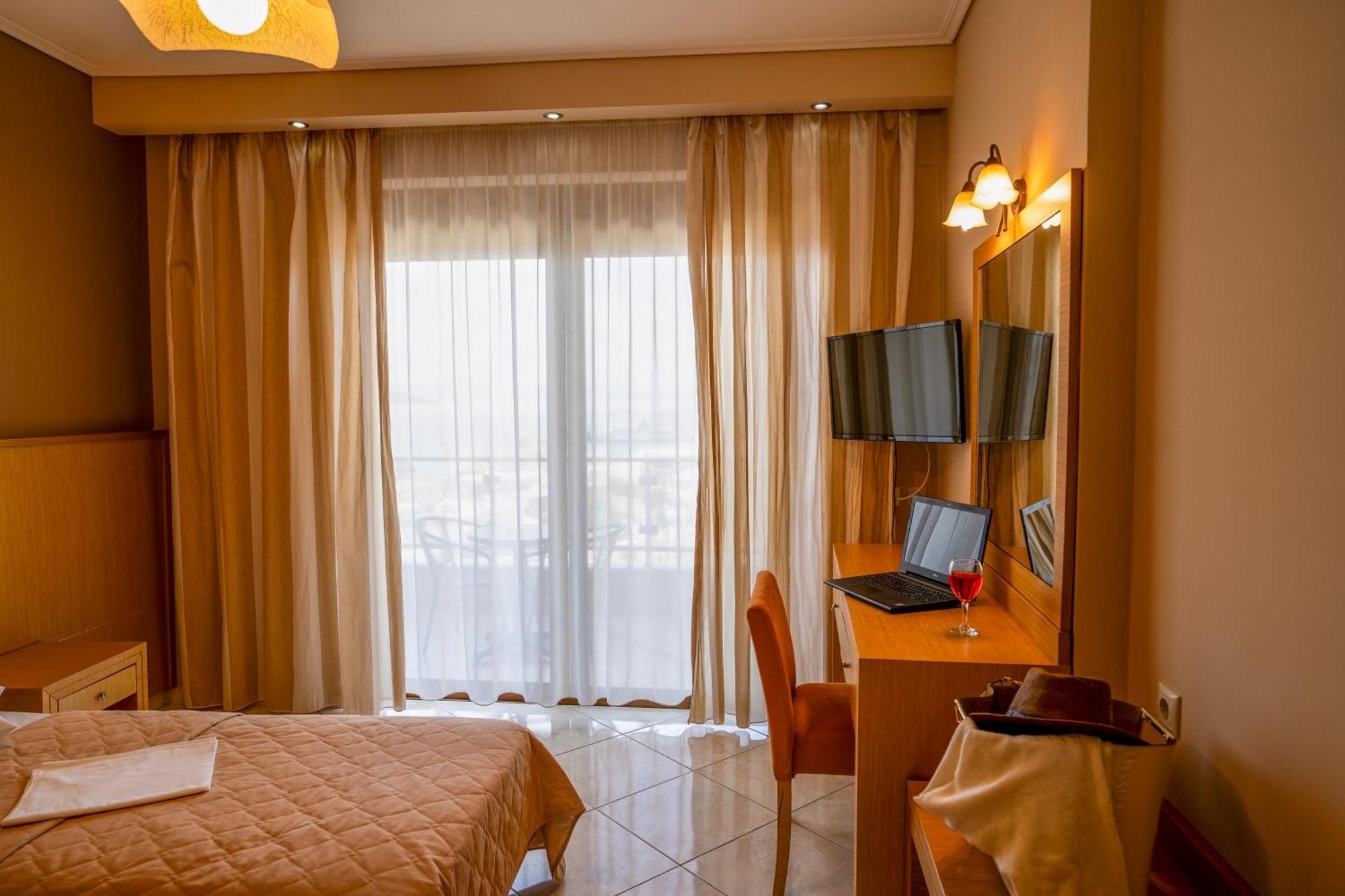 Evia Hotel & Suites Marmari  Экстерьер фото
