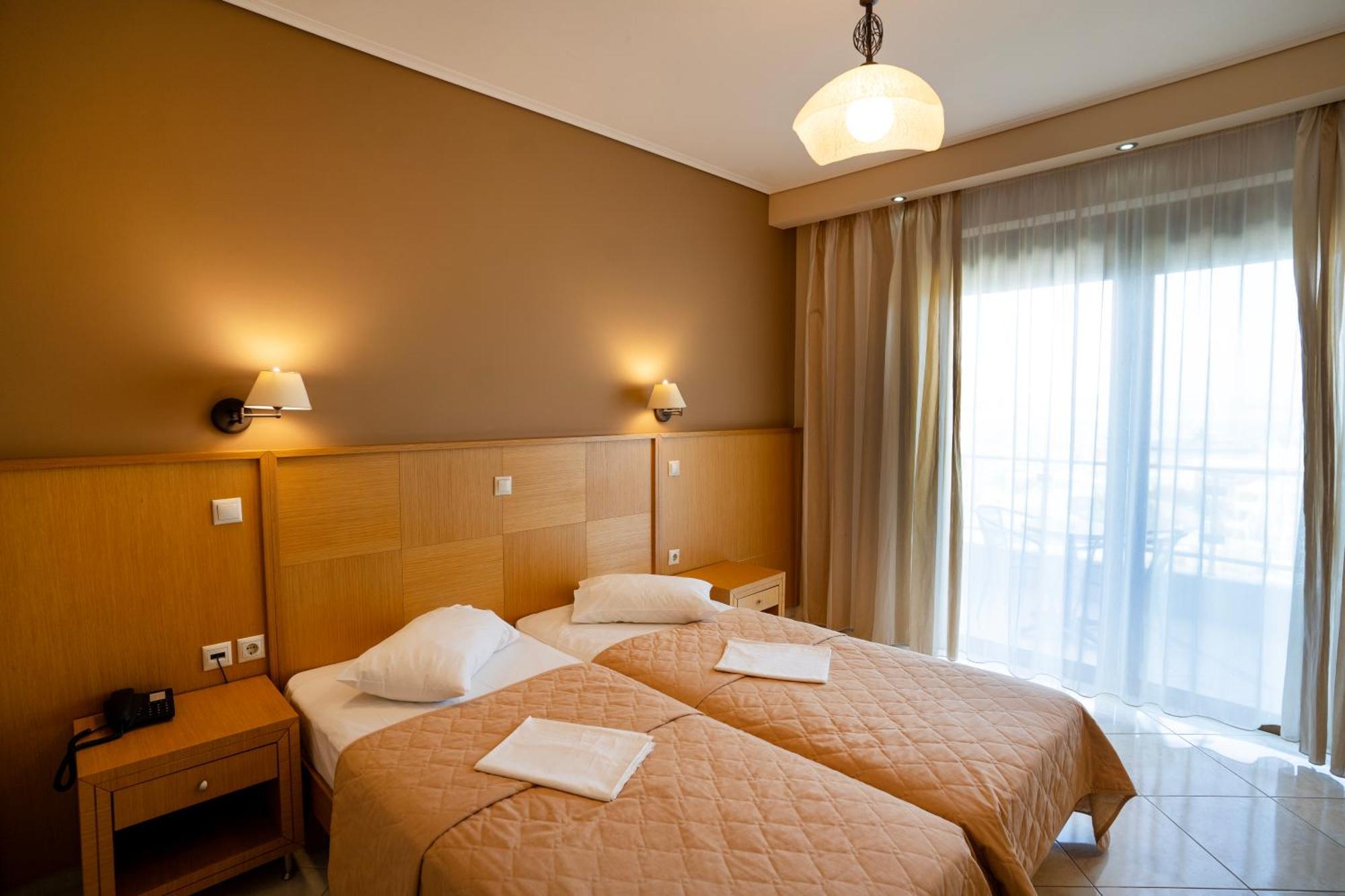 Evia Hotel & Suites Marmari  Экстерьер фото